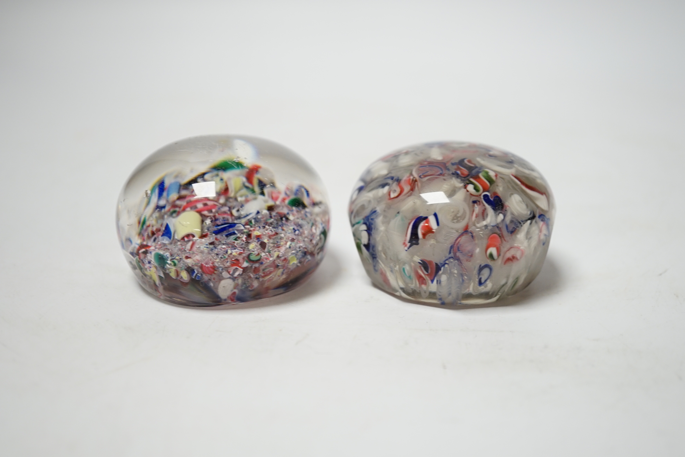 Two French ‘scrambled’ glass paperweights, 6cm diameter